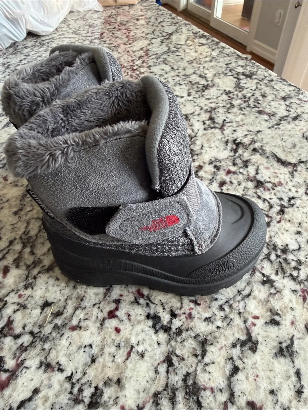 The North Face Kids Gray and Black Waterproof Snow Boots with Red Logo